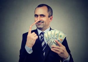 man-with-long-nose-holding-cash